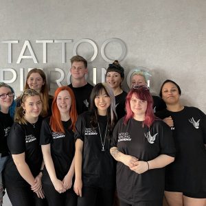 students on piercing course